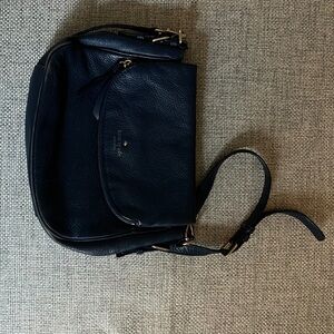 Kate Spade New York blue crossbody bag.